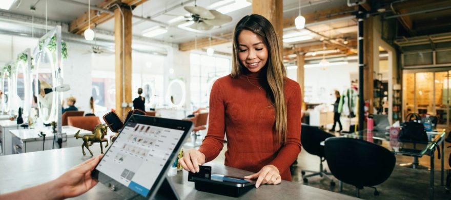Interchange-plus vs. flat-rate credit card processing comparison showing merchant transaction fees and potential business savings.